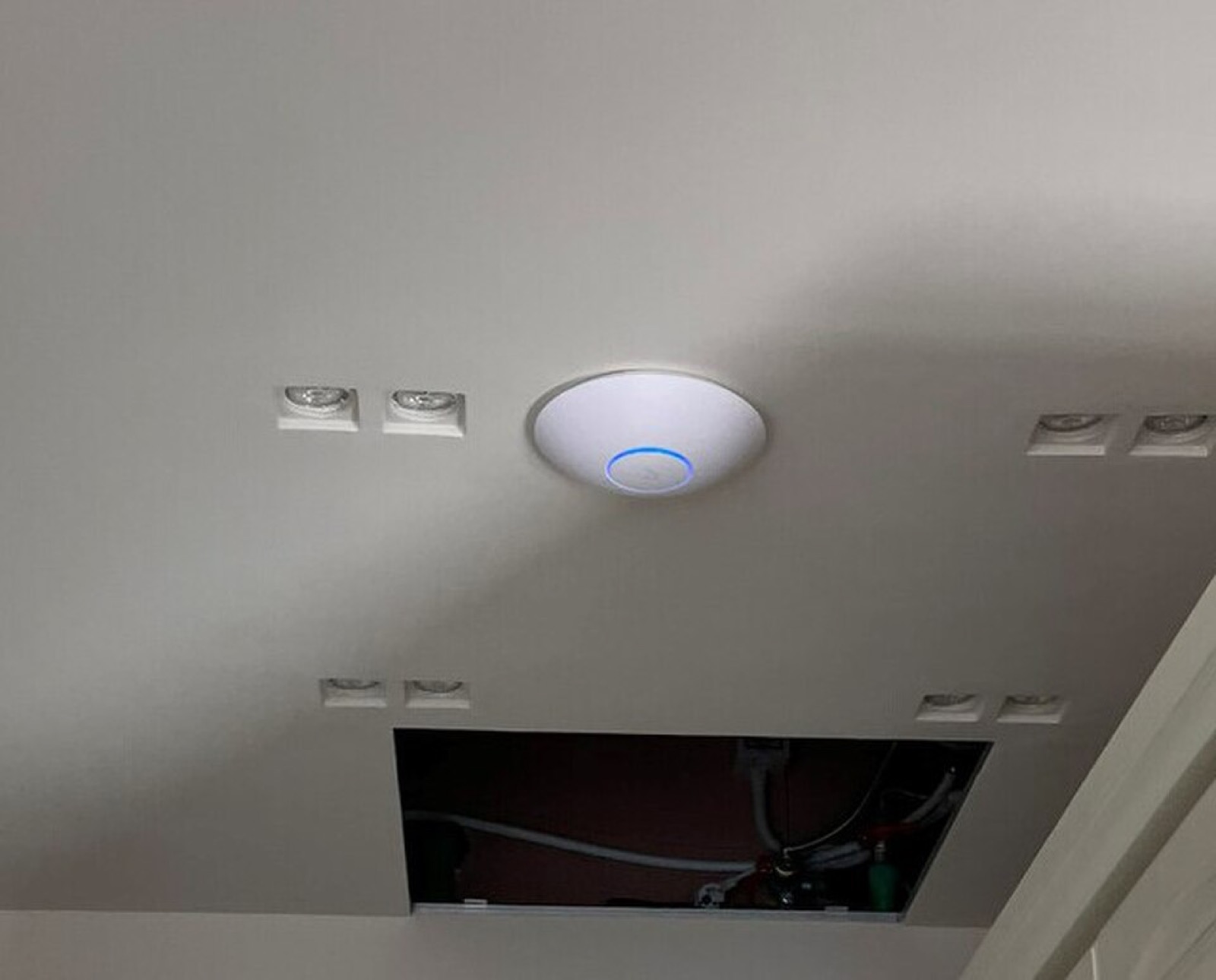 Business Wi-Fi access point installed for office network coverage